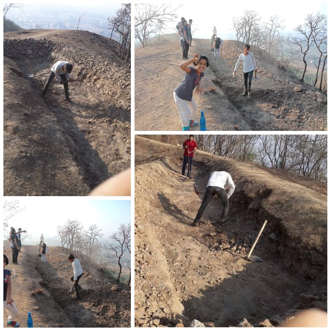 Volunteers working on hillside during Laghu Wan drive